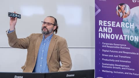 Dr Martin Sykora presents to the Loughborough Business School research themes launch audience.